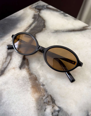 Black-oval-sunglasses-with-brown-category-2-lenses