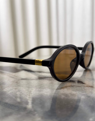 Black-oval-sunglasses-with-brown-category-2-lenses