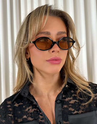 Black-oval-sunglasses-with-brown-category-2-lenses