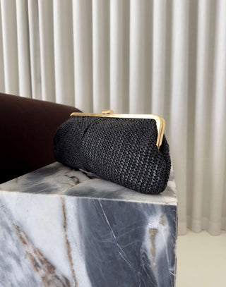 Black-straw-clutch-with-gold -lift-lock-and-chain-strap