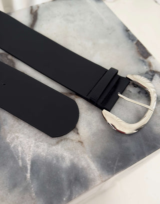 Black wide belt with round silver buckle