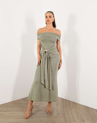 Model in green off shoulder fitted midi dress with gold buckle detail