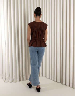 Brown linen-blend relaxed sleeveless top with gathered detailing