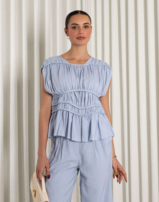 Blue linen blend sleeveless top with gathered detailing, relaxed fit