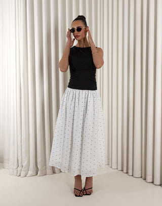 Black polka dot two-tone midi dress with fitted gathered bust