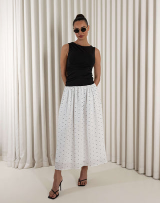 Black polka dot two-tone midi dress with fitted gathered bust