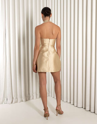 Champagne halter mini dress with structured A ine and pockets