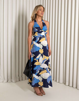 Blue midi dress with oversized floral print and tie halter neckline