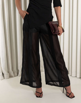 Black high waisted pants with sheer organza legs and shorts lining