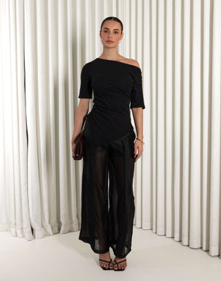 Black high waisted pants with sheer organza legs and shorts lining