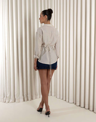 Dark denim high-waist fitted mini skirt with button zip and pockets