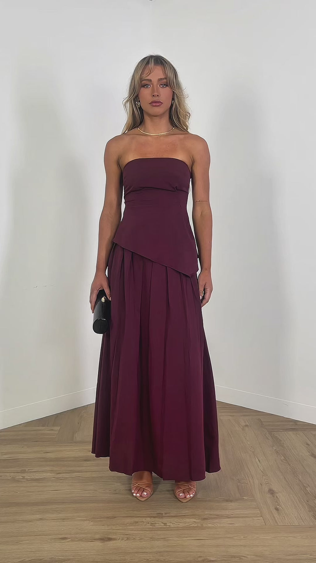 Laurel strapless fitted top in wine, asymmetric hem