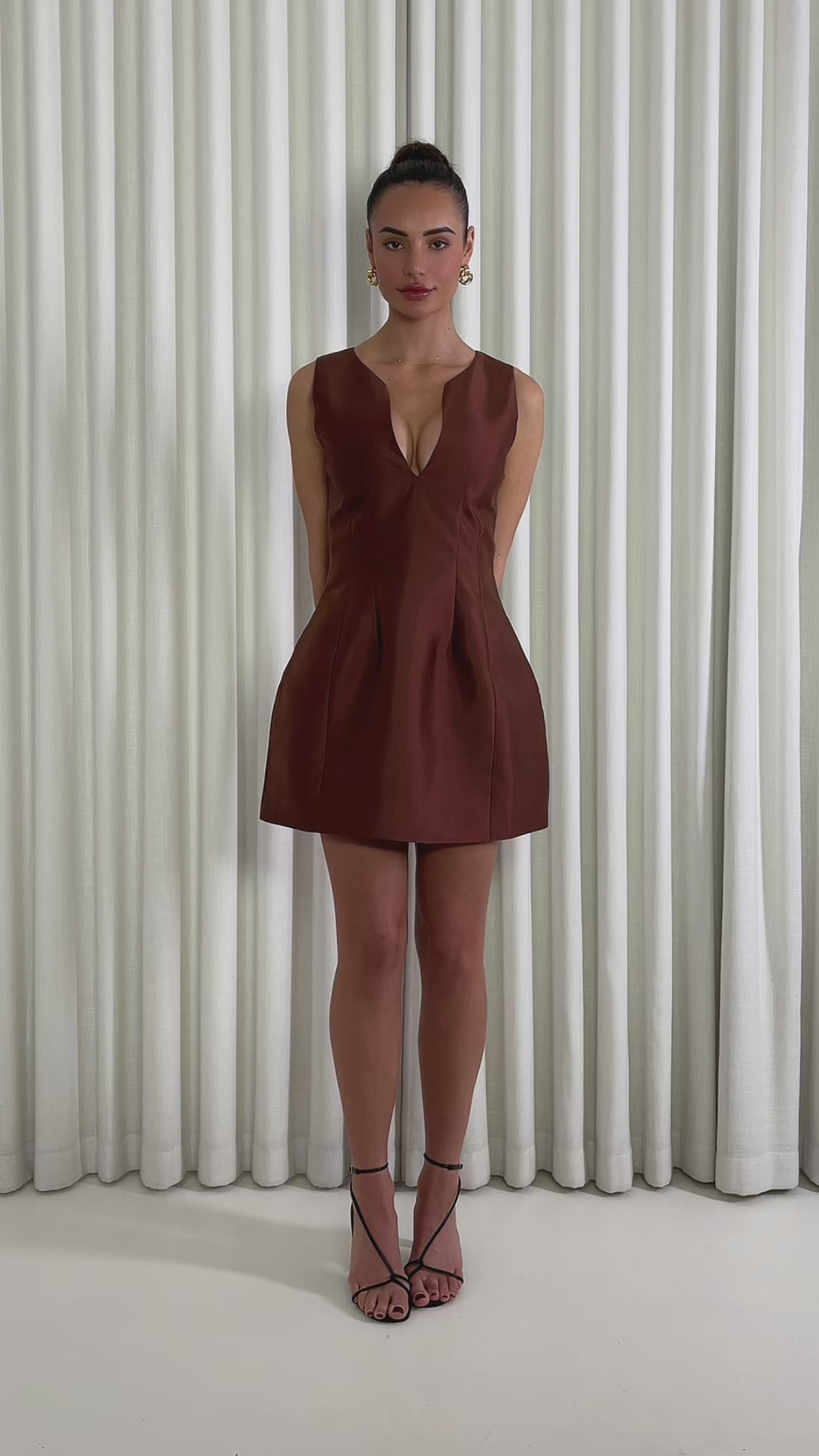 Brown A-line mini dress with V-neck, hook &amp; eye and side pockets