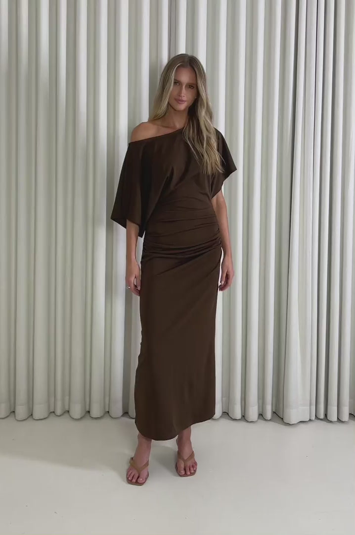 Model showing the Grayson Brown Midi Dress from the front, side and back to demonstrate its fit and movement.