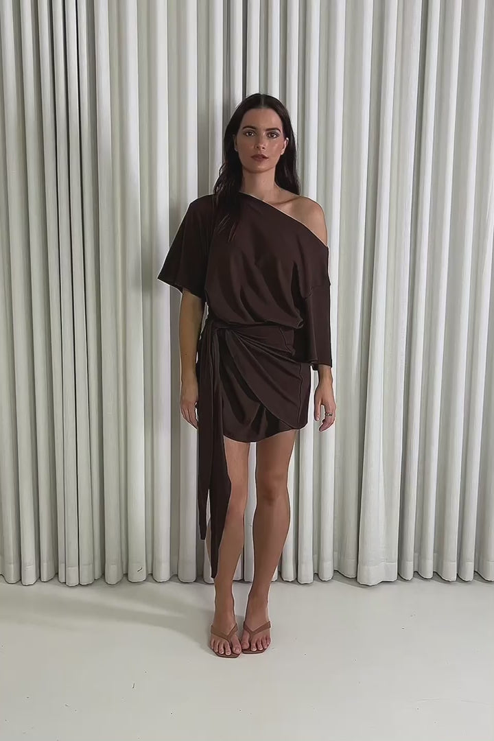 Model showing the Isabella Off Shoulder Dress from the front, side and back to demonstrate its fit and movement.