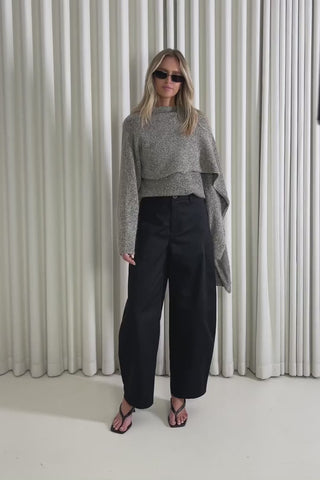 Model showing the Andy Barrel Pants from the front, side and back to demonstrate their fit and movement.