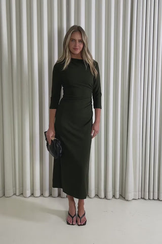 Model showing the Kirby Tight Midi Dress from the front, side and back to demonstrate its fit and movement.