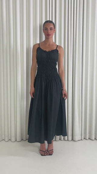 Black 100% cotton midi dress with V ruffle neckline and gathered bust