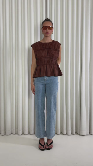 Brown linen-blend relaxed sleeveless top with gathered detailing