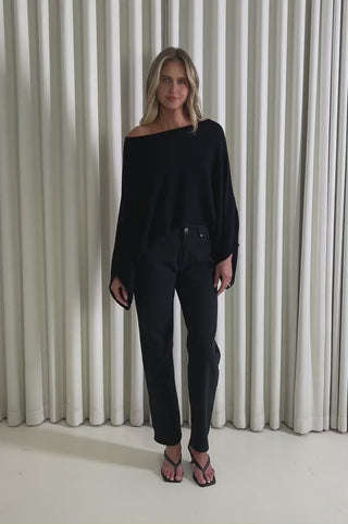 Model showing the Jessa Off Shoulder Knit Top from the front, side and back to demonstrate its fit and movement.