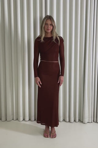 Model showing the Lucas Crop Top and Midi Skirt Set from the front, side and back to demonstrate its fit and movement.
