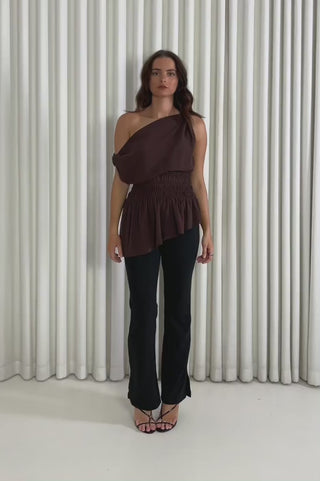 Model showing the Bec Off Shoulder Top from the front, side and back to demonstrate its fit and movement.
