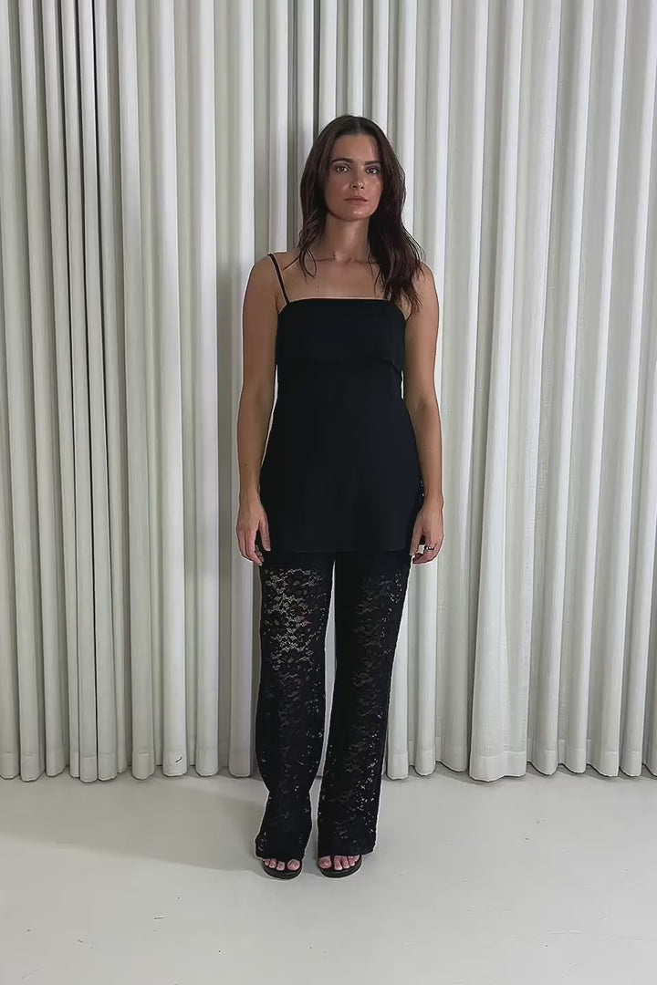 Model showing the Jacob Stripe T-Shirt and Black Lace Pants from the front, side and back to demonstrate its fit and movement.