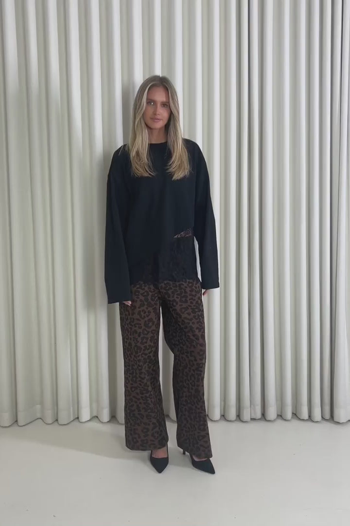 Model showing the Samira Lace Top and Melissa Leopard Jeans from the front, side and back to demonstrate its fit and movement.