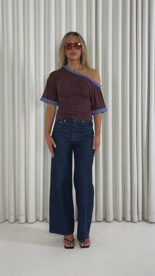 Brown off shoulder relaxed top with blue contrast trim and short sleeves