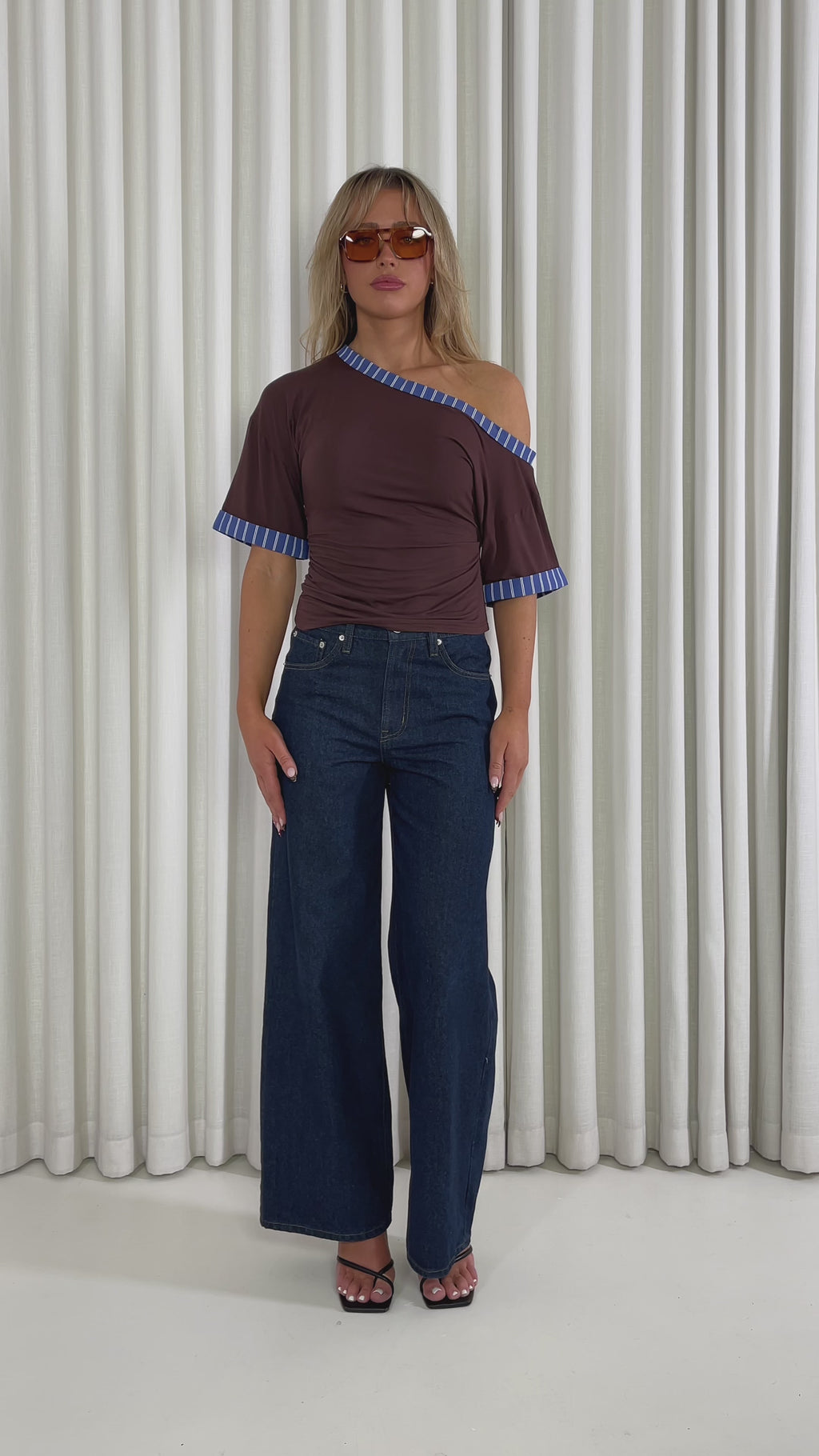 Brown off shoulder relaxed top with blue contrast trim and short sleeves
