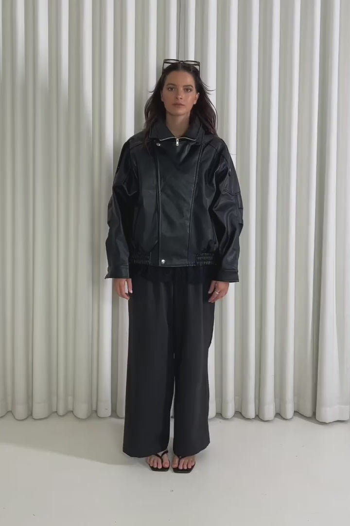 Model showing the John Black Bomber Jacket from the front, side and back to demonstrate its fit and movement.