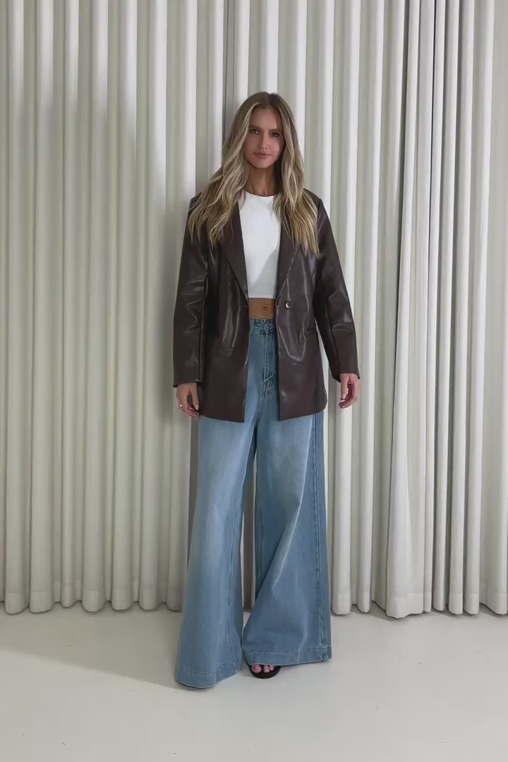 Model showing the Graham Brown Blazer from the front, side and back to demonstrate its fit and movement.
