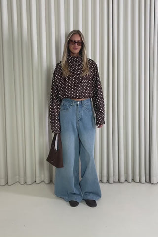 Model showing the Dennis Polka Dot Jacket from the front, side and back to demonstrate its fit and movement.
