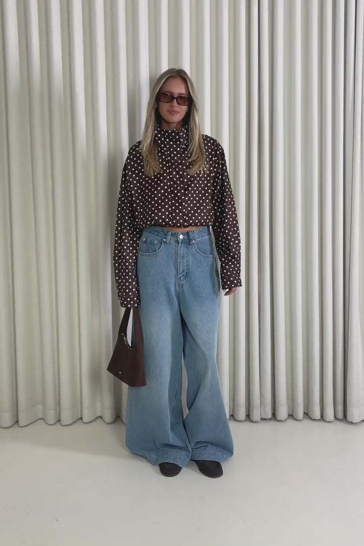 Model showing the Dennis Polka Dot Jacket from the front, side and back to demonstrate its fit and movement.