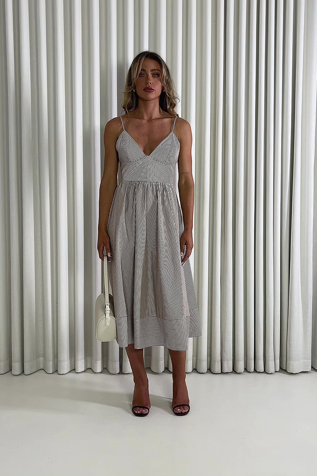 Emery brown fit and flare dress with flattering stripe placement