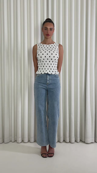 Brown and white polka dot fitted shirred sleeveless top