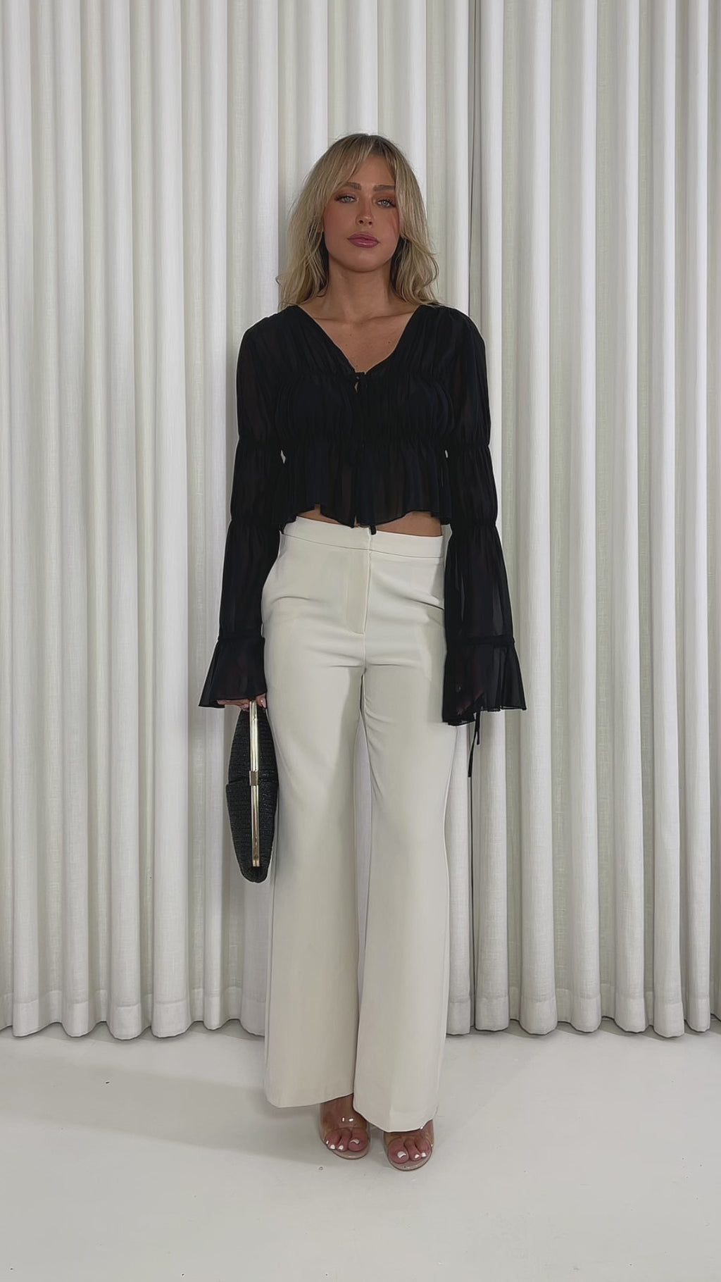 Black sheer relaxed top with flared tie sleeves and tie-front