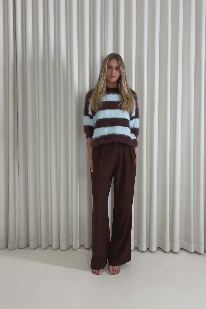 Model showing the Beau Stripe Knit from the front, side and back to demonstrate its fit and movement.