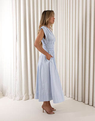 Blue cotton midi dress with gathered shoulders and shirred waist