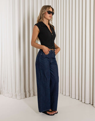 Black sleeveless collared top with two way gold zip and darts