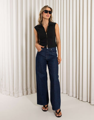 Black sleeveless collared top with two way gold zip and darts